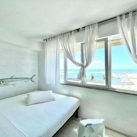 Апартаменты Sunset Loft Ливорно Номер фото